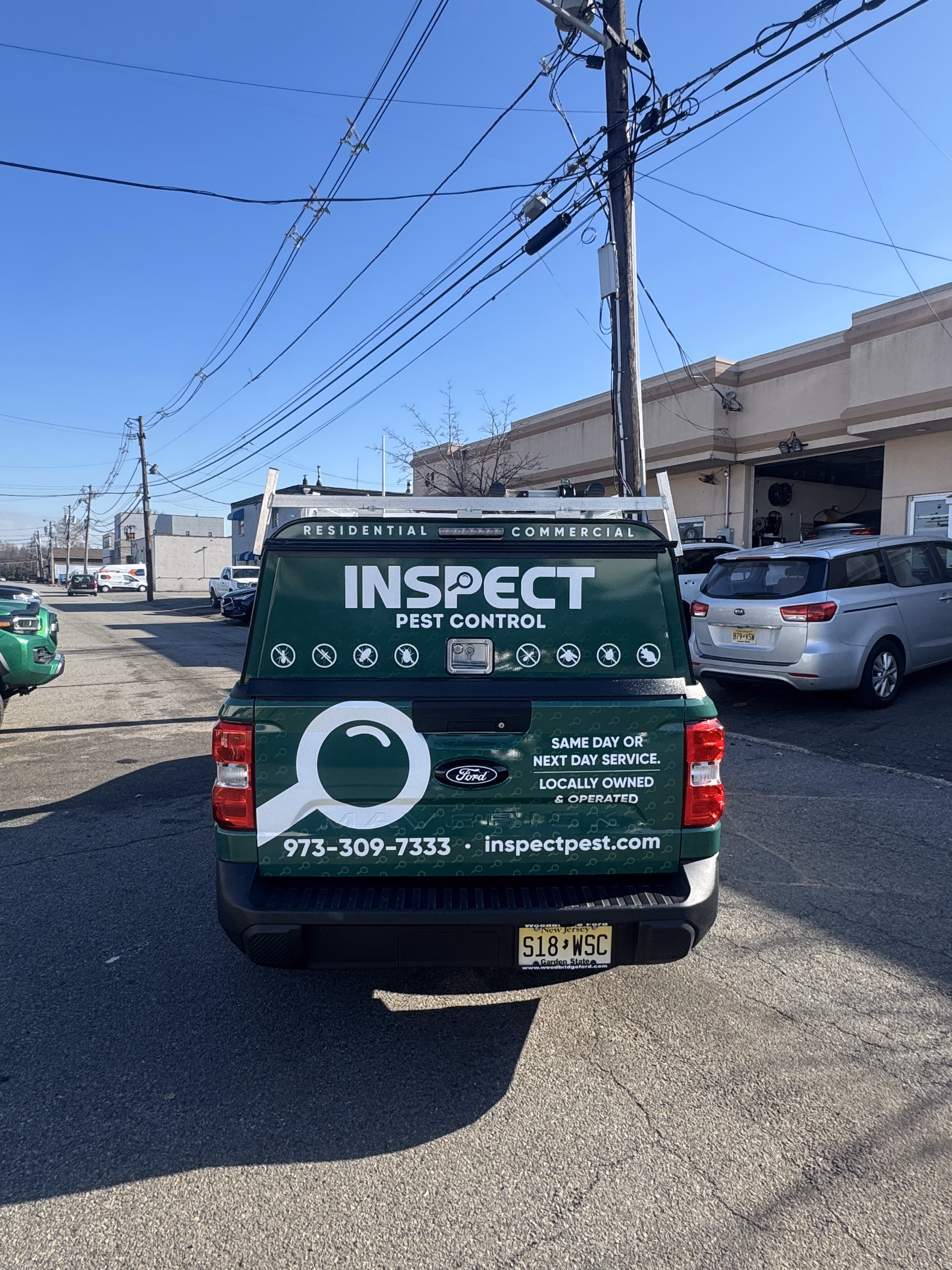 Inspect Pest Control vehicle wrap in Asbury Park, NJ