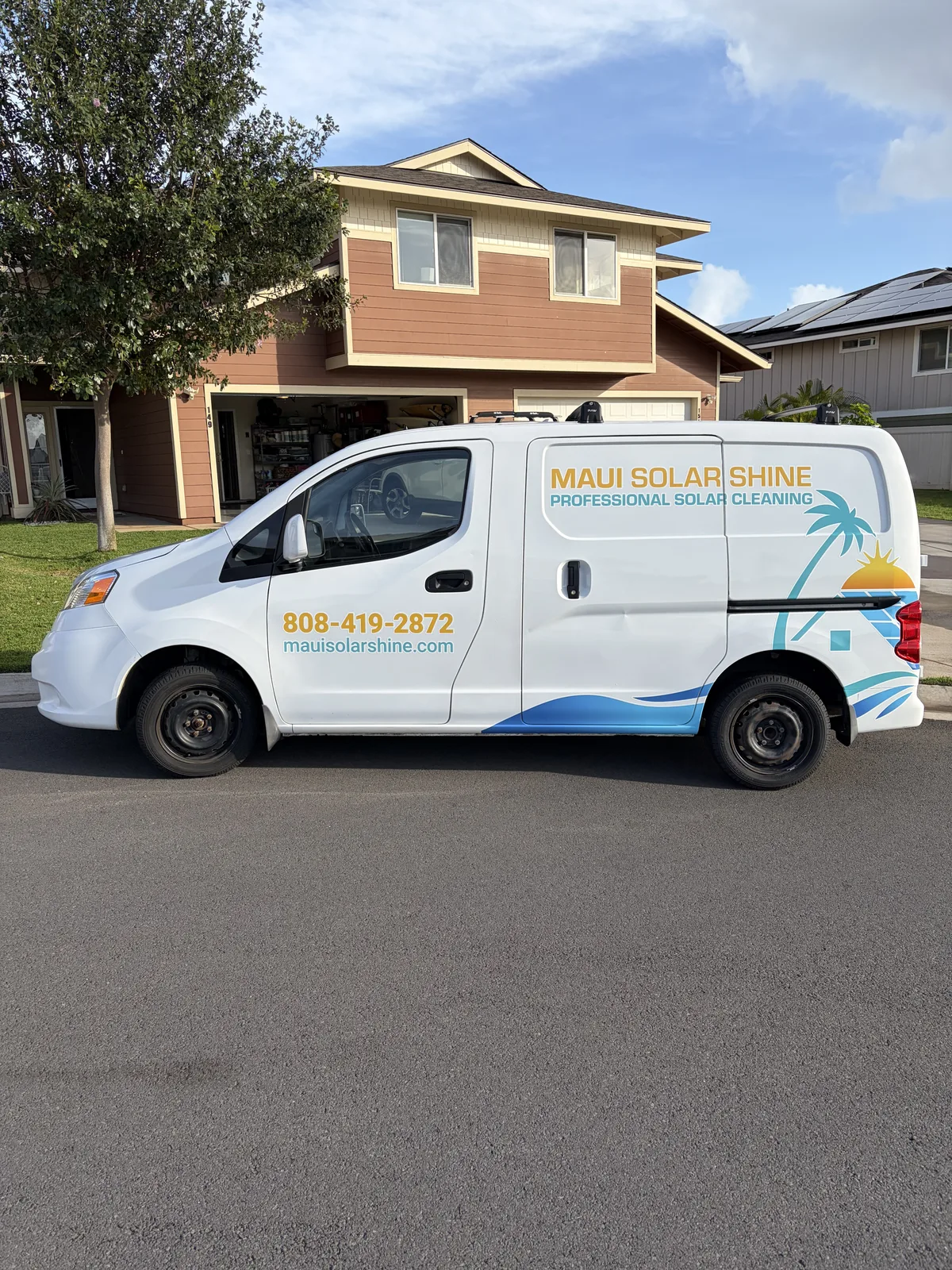 Spot graphics on a Nissan NV200 van in Wailuku, HI