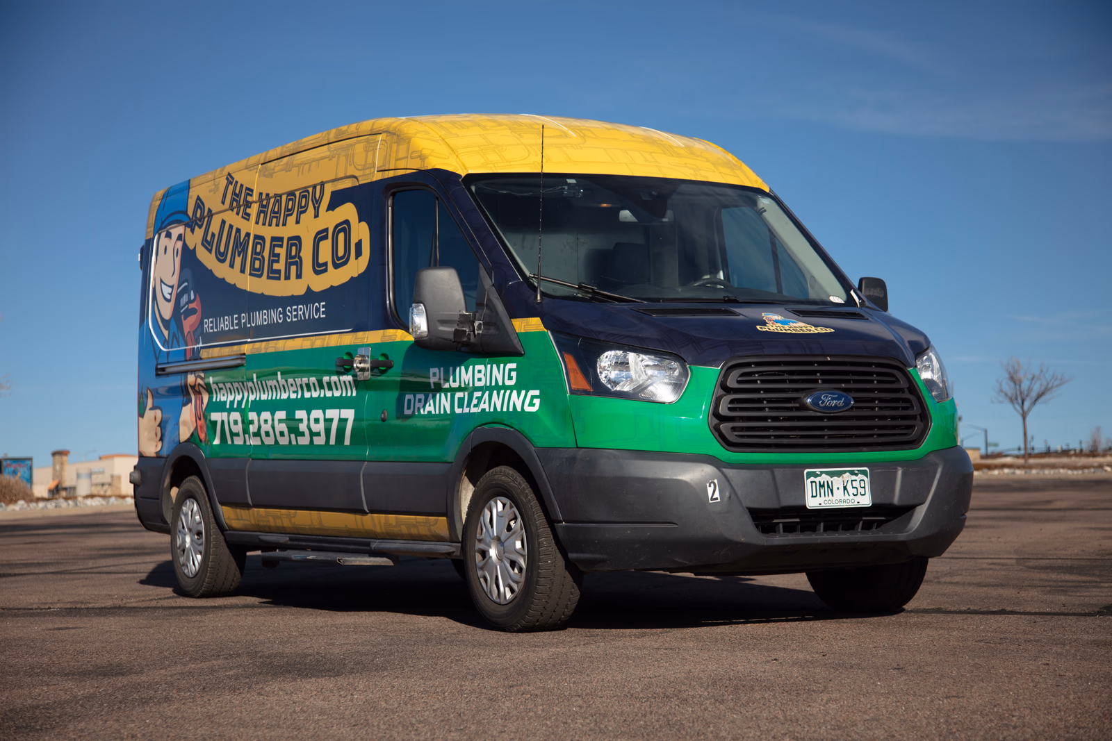 The Happy Plumber Co. vehicle wrap in Colorado Springs, CO