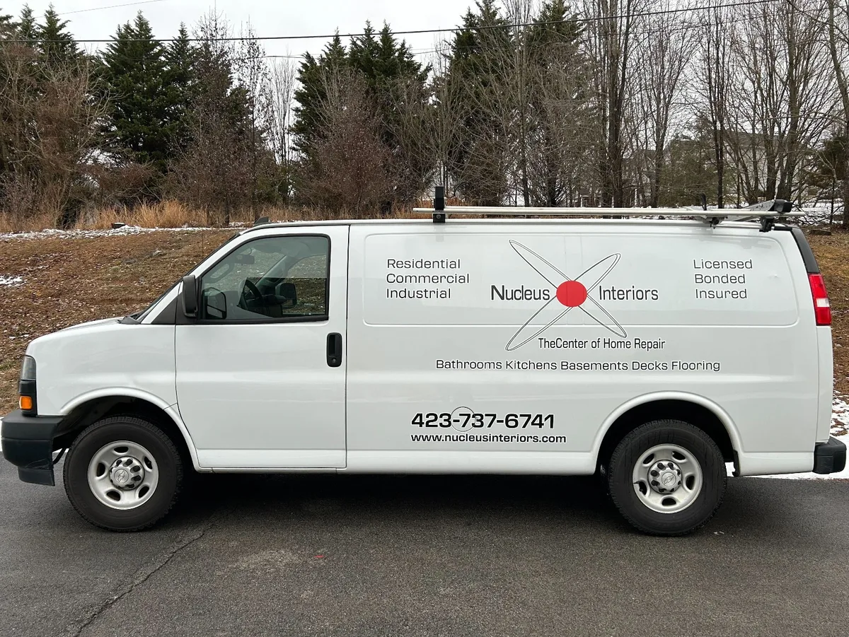 Spot graphics on a Chevrolet Express Van in Johnson City, TN