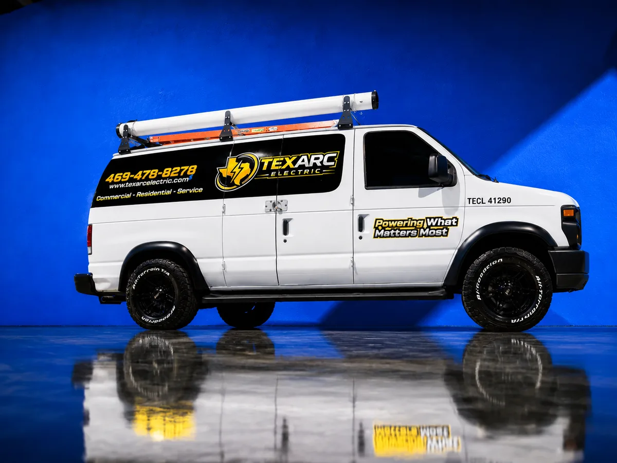 Spot graphics on a Ford E-Series van in Mesquite, TX