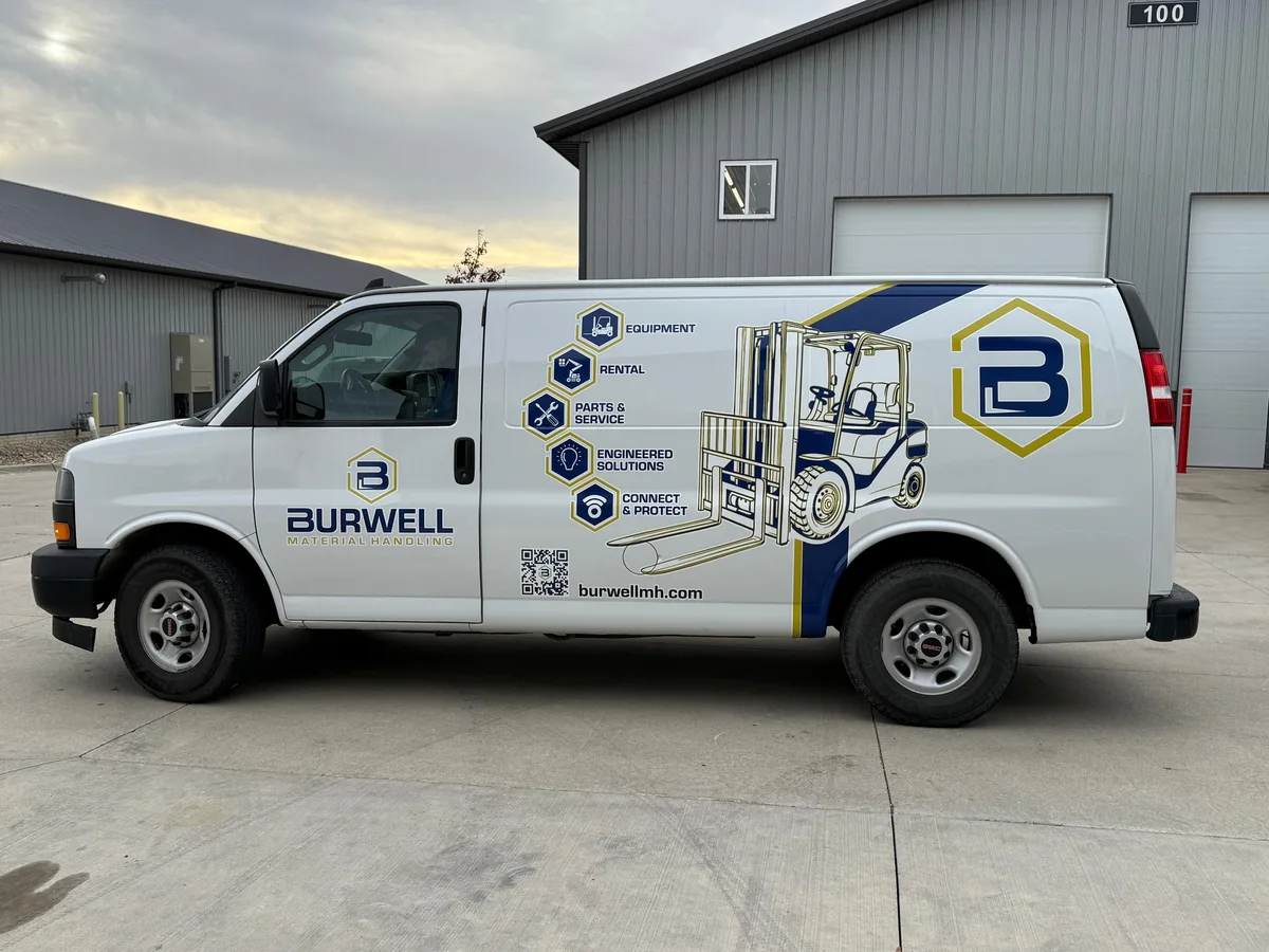 Spot graphics on a Chevrolet Express van in Waterloo, IA