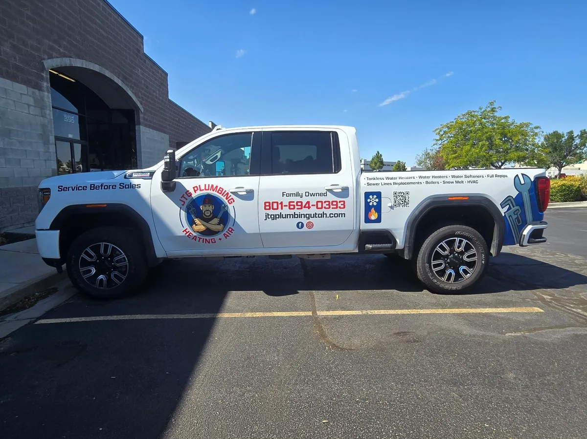 Spot graphics on a GMC Sierra truck in Kaysville, UT