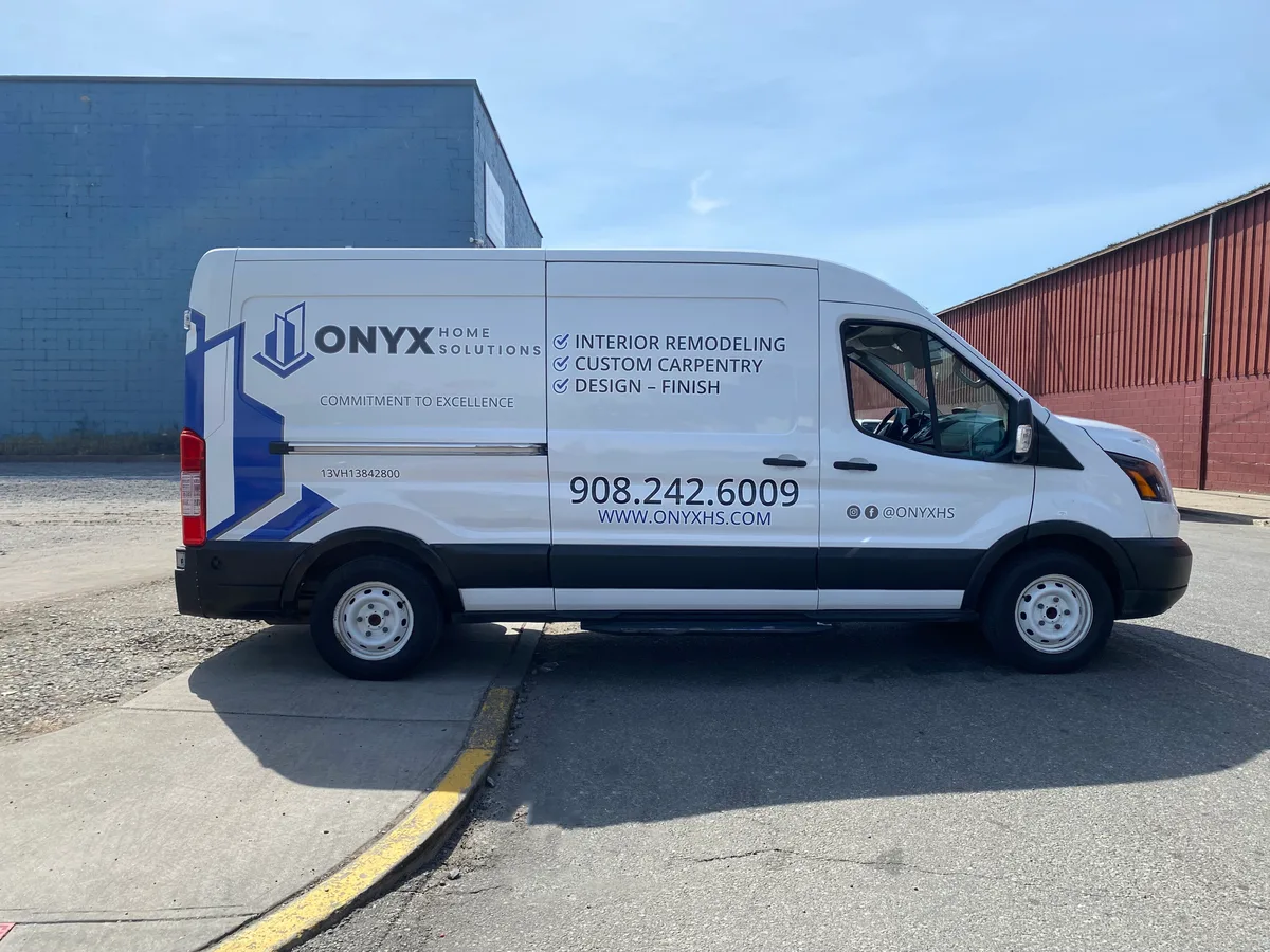 Spot graphics on a Ford Transit 150 van in Jersey City, NJ